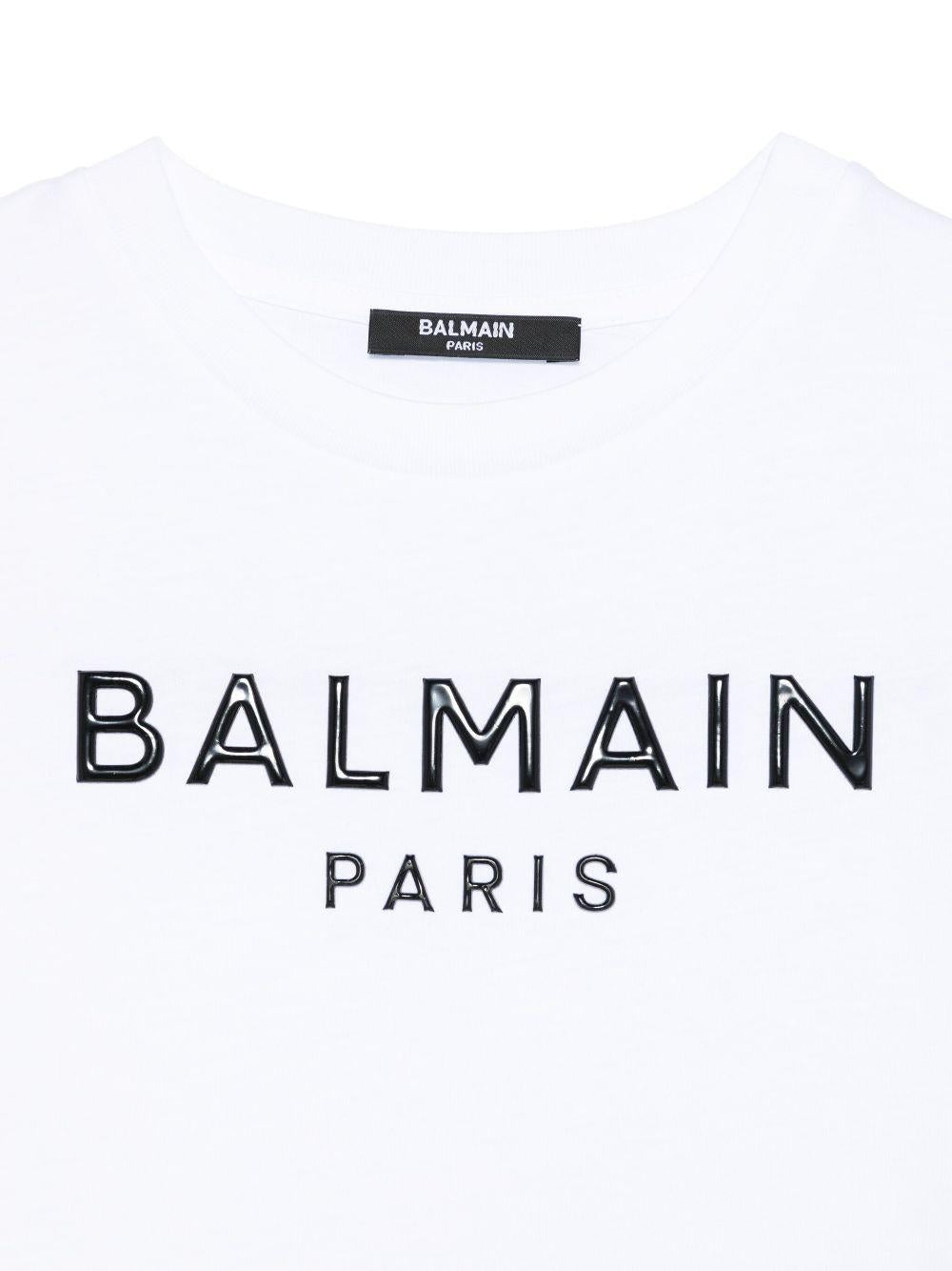 Abito con logo in rilievo per bambina Balmain Kids bianco con girocollo BW1B11 Z0082 100NE BALMAIN KIDS