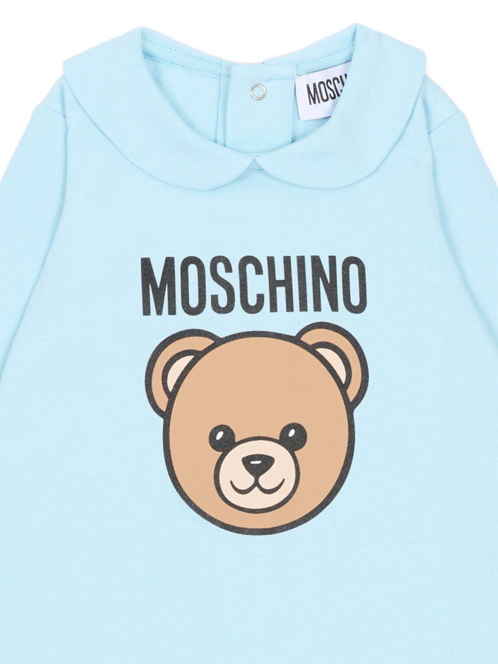 Tutina per neonato Moschino Kids azzurra con stampa Teddy Bear MUY098LCA19 40304 MOSCHINO KIDS