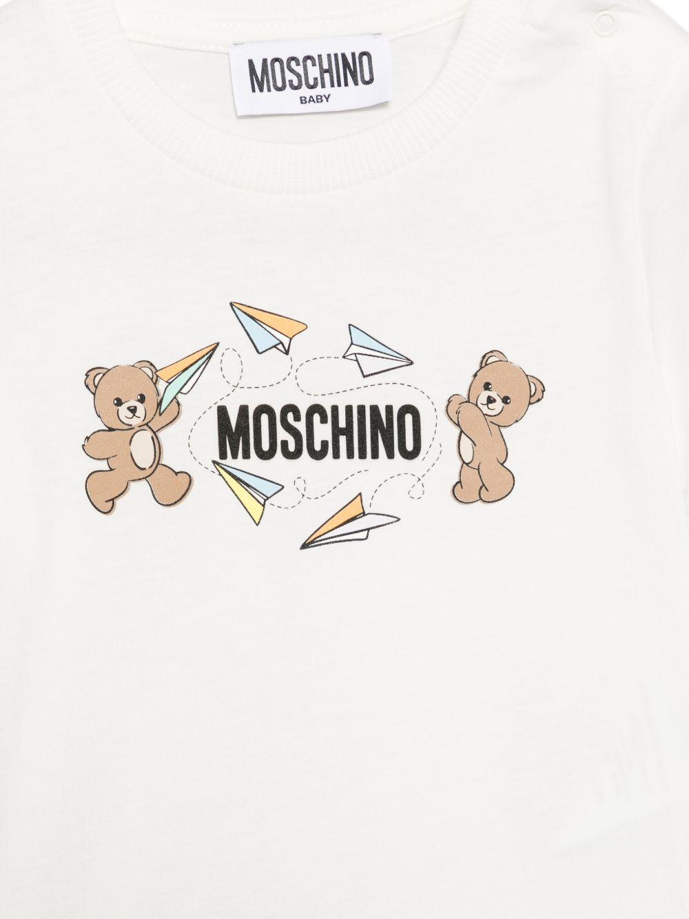 Set t-shirt e shorts per neonata Moschino Kids bianco e lilla con stampa M5G00MLAA01 83695 MOSCHINO KIDS