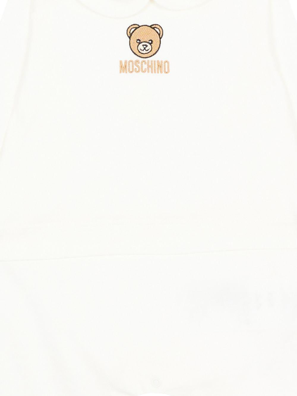 Tutina per neonati Moschino Kids bianca con colletto alla Peter Pan MOY06ZLAA23 10063 MOSCHINO KIDS