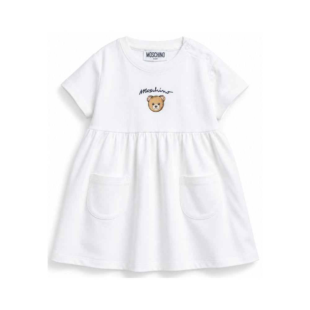 Abito per neonata Moschino Kids bianco con dettaglio orsetto MDV0DGLCA19 10101 MOSCHINO KIDS