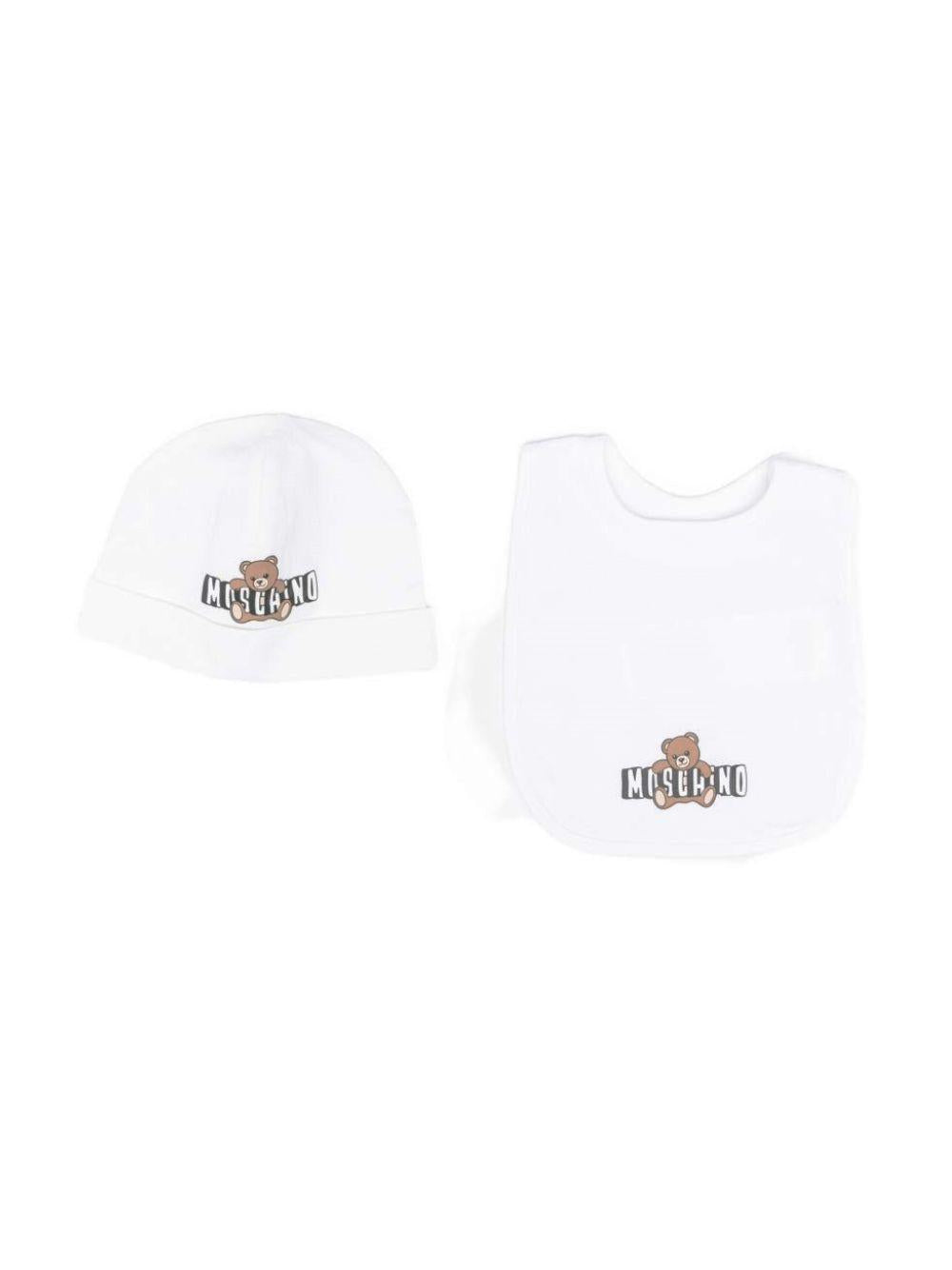 Set cappellino e bavaglino per neonati Moschino Kids bianco con logo sul davanti MUY095LCA19 10101 MOSCHINO KIDS