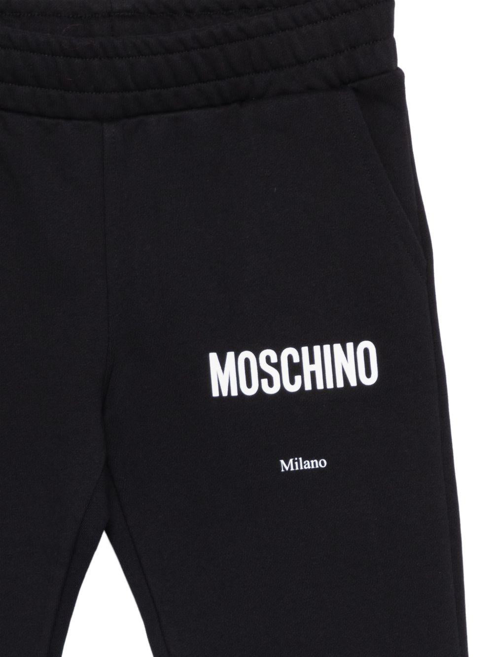 Pantaloni per bambino Moschino Kids nero con caviglie a coste HUP08YLCA32 60100 MOSCHINO KIDS