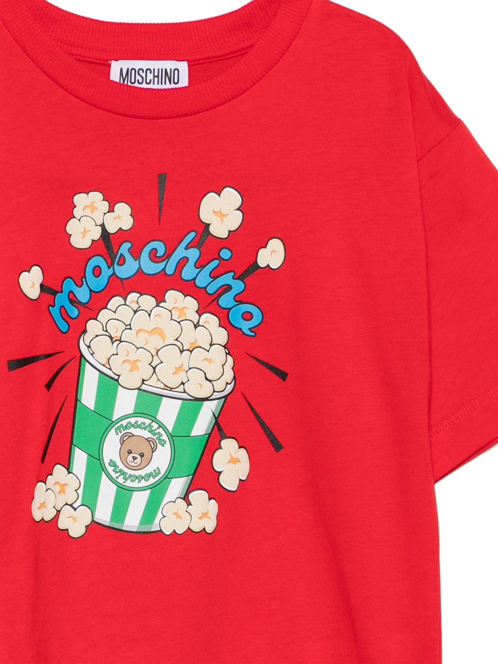 T-shirt per bambini Moschino Kids rossa con stampa grafica HRM05WLAA10 50109 MOSCHINO KIDS