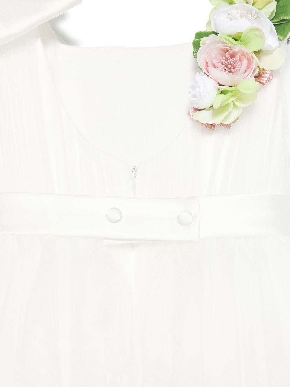Abito per bambina Colorichiari bianco in tulle con fiocco e applicazione a fiori FL108002 4696 15 COLORICHIARI