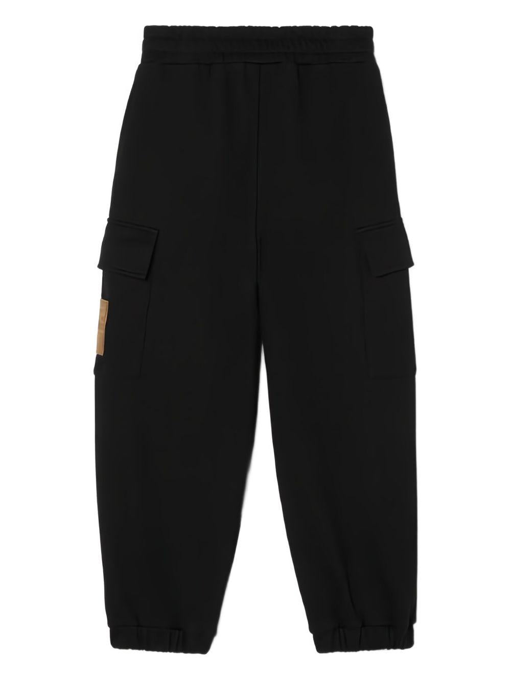 Pantaloni sportivi per bambino Fendi Kids neri con applicazione logo JUF171 5V0 F0GME FENDI KIDS