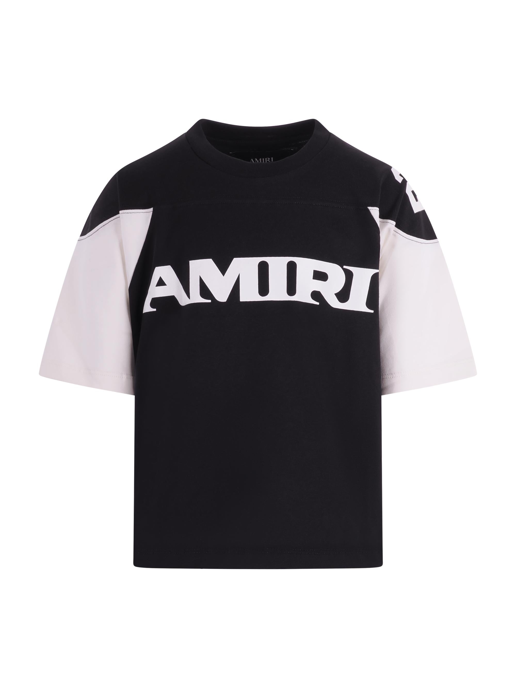 T-shirt per bambino Amiri Kids nero con logo sul davanti ACTOJR1002 001 AMIRI KIDS