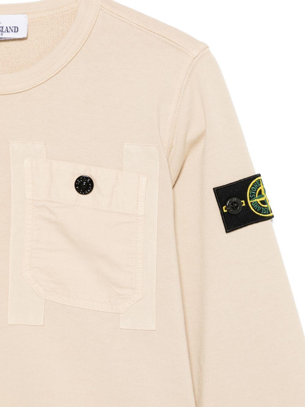 Felpa per bambino Stone Island Junior beige con applicazione logo sulla manica L1S166100017S0040 V0090 STONE ISLAND JUNIOR
