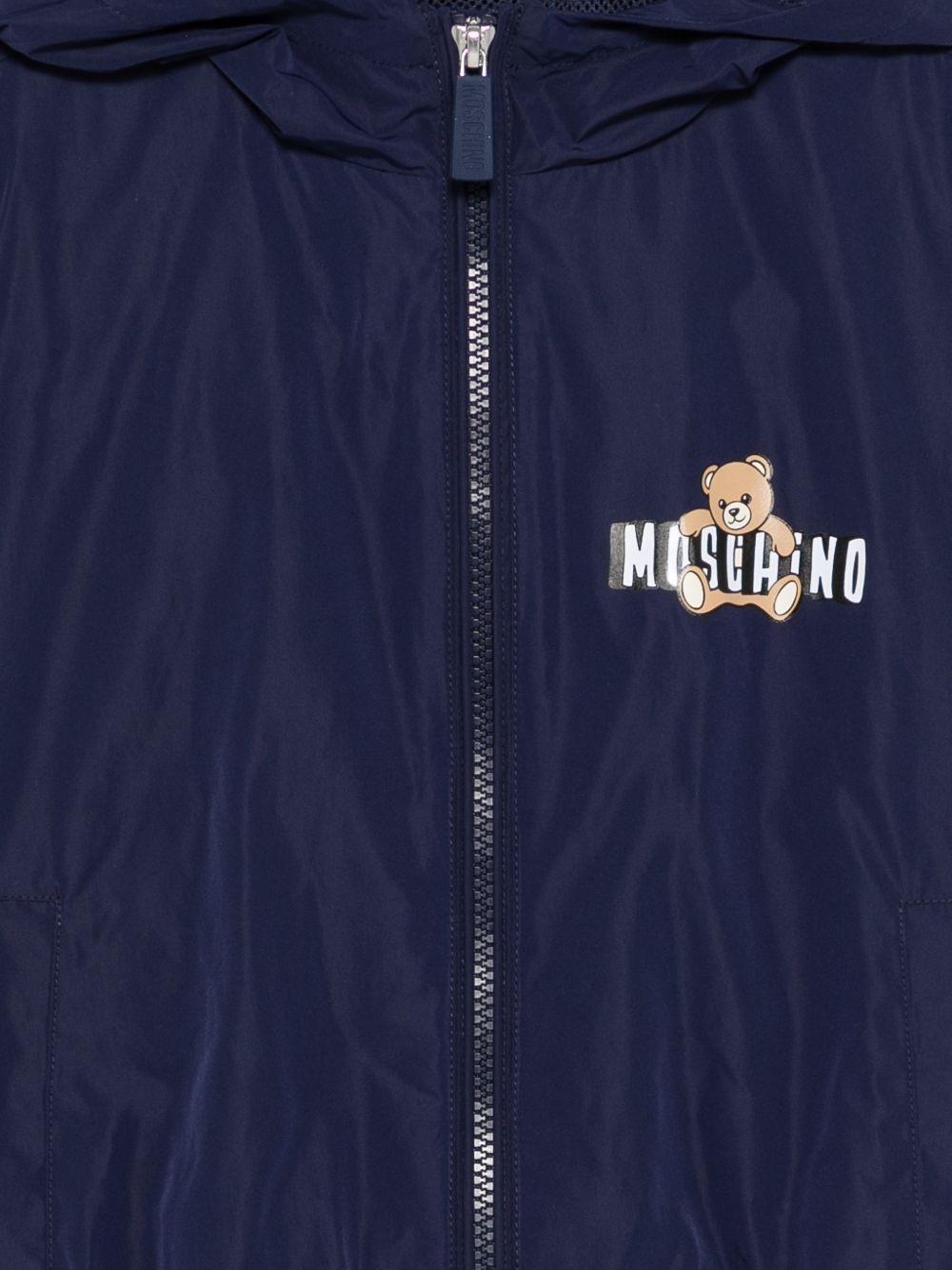 Giubbino per bambini Moschino Kids blu con stampa Teddy Bear sul davanti HUS05KL3A39 40016 MOSCHINO KIDS