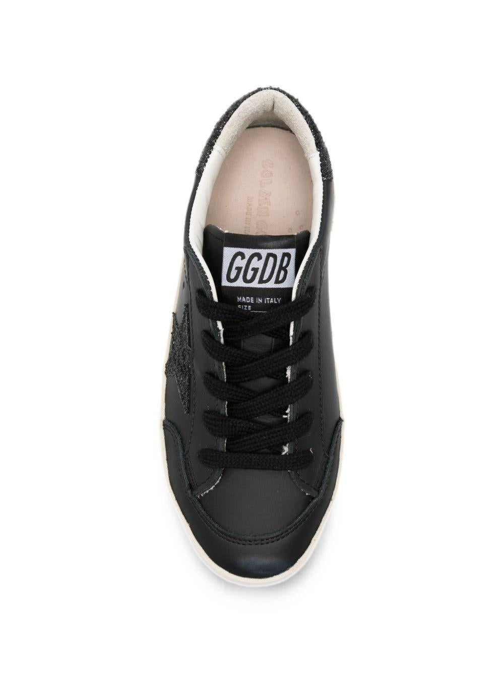 Sneakers per bambina Goolden Goose Kids nera con stella glitterata<BR/> F00107F008661 90100 GOLDEN GOOSE KIDS