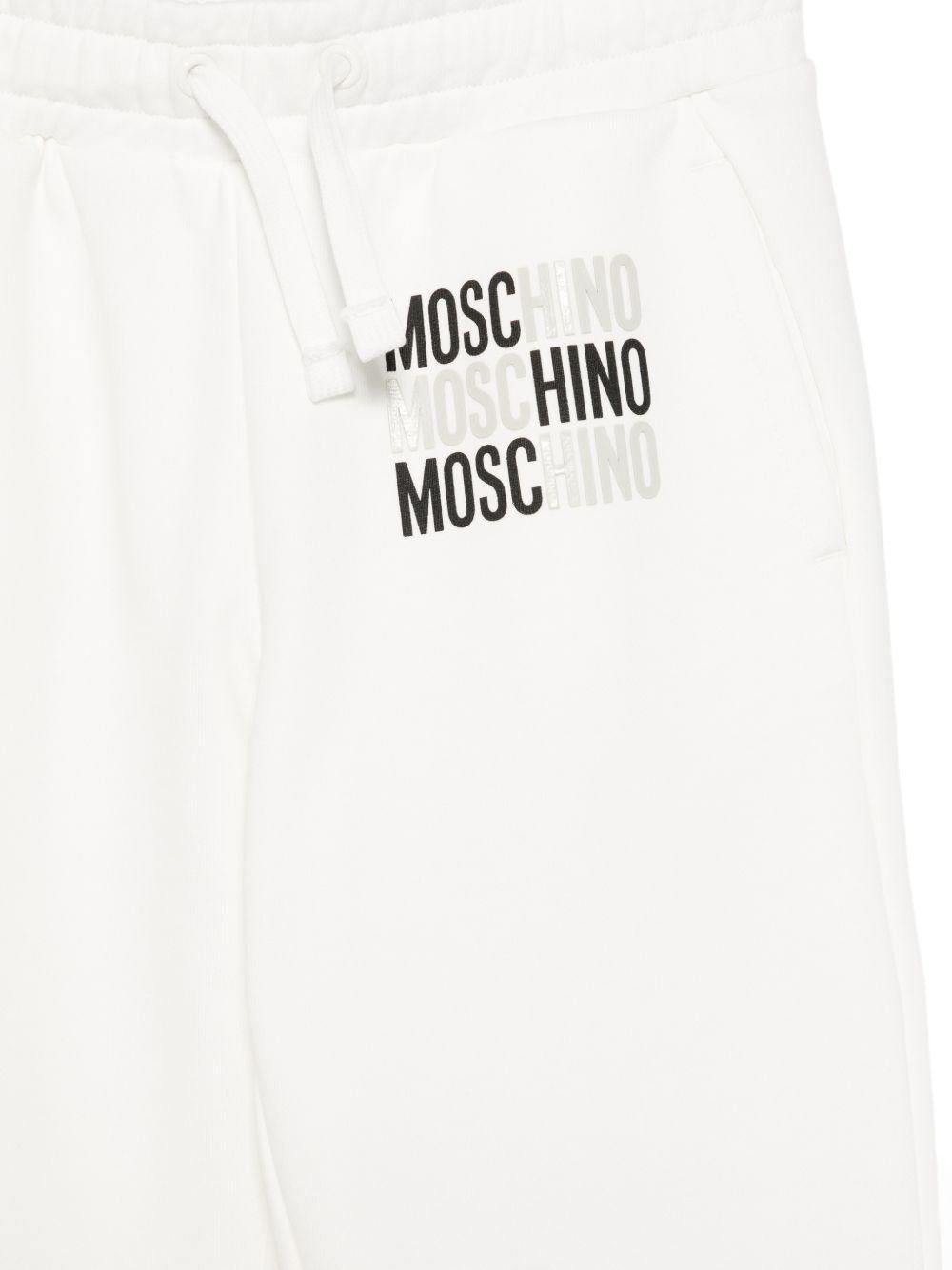 Pantaloni sportivi per bambino Moschino Kids bianchi con logo sul davanti HMP07CLCA32 10063 MOSCHINO KIDS
