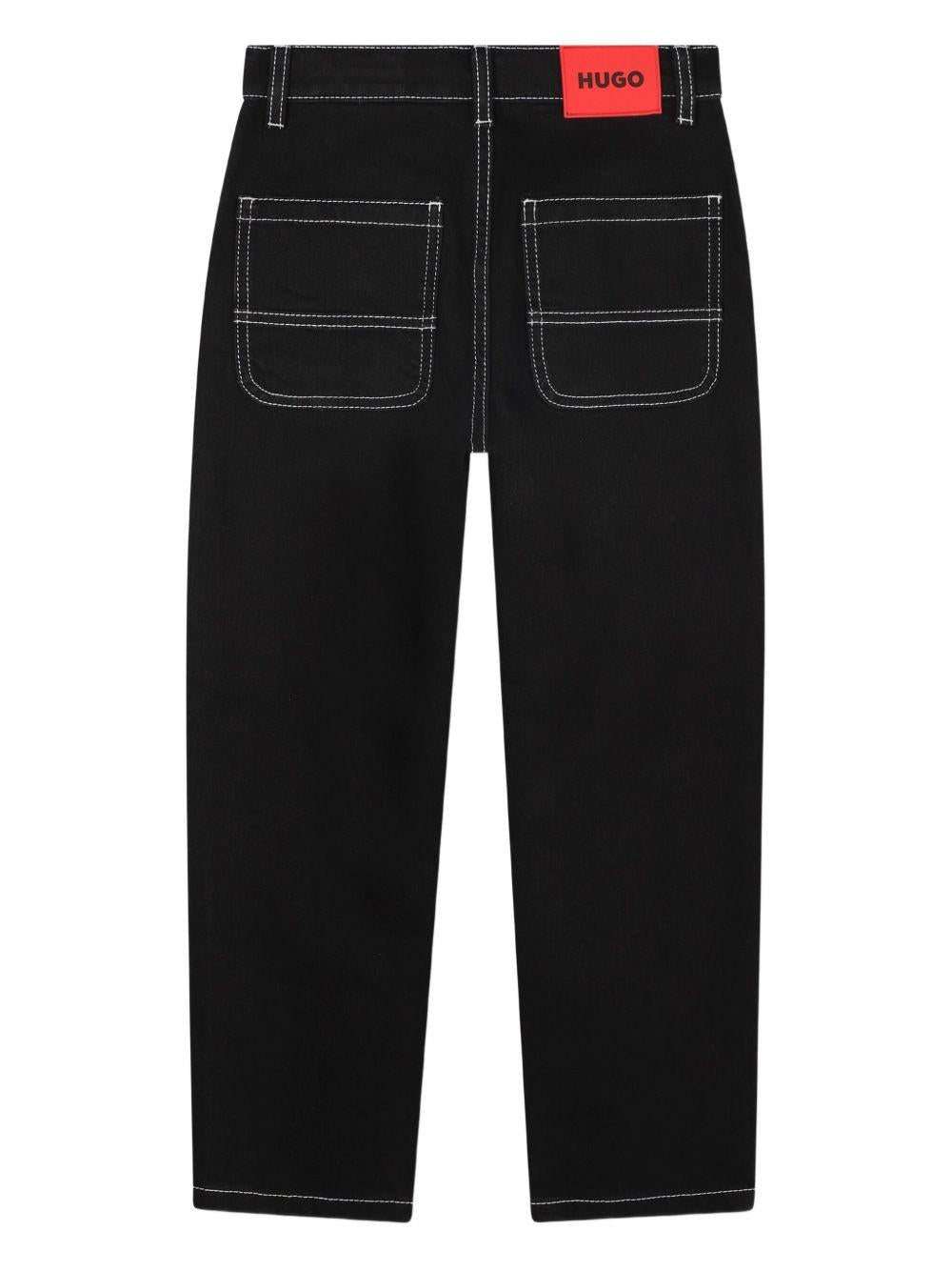 Jeans per bambino Hugo Kids neri con applicazione posteriore con logo G00473 Z09 Hugo