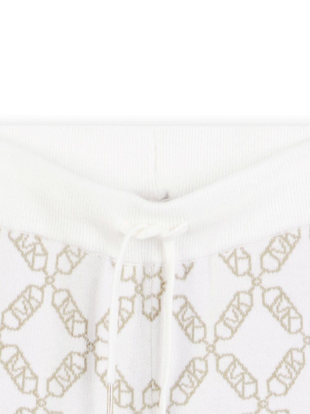 Pantaloni sportivi per bambina Michael Kors Kids bianchi con monogramma R30452 N52 MICHAEL KORS KIDS