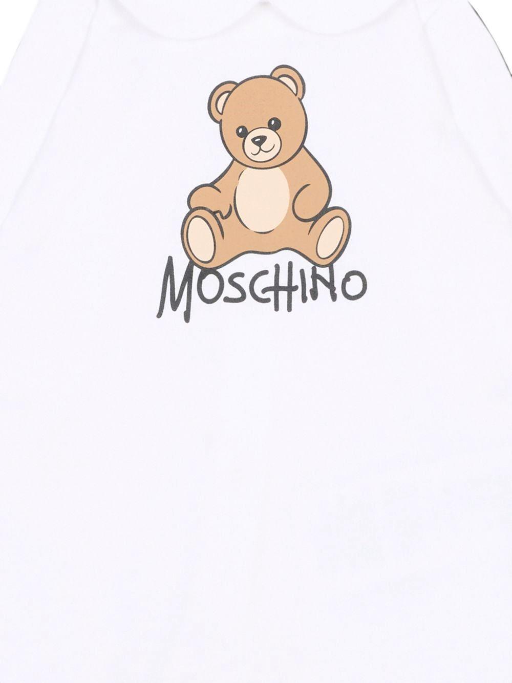 Tutina per neonati Moschino Kids bianca con dettaglio Teddy Bear M5Y037LCA40 10101 MOSCHINO KIDS