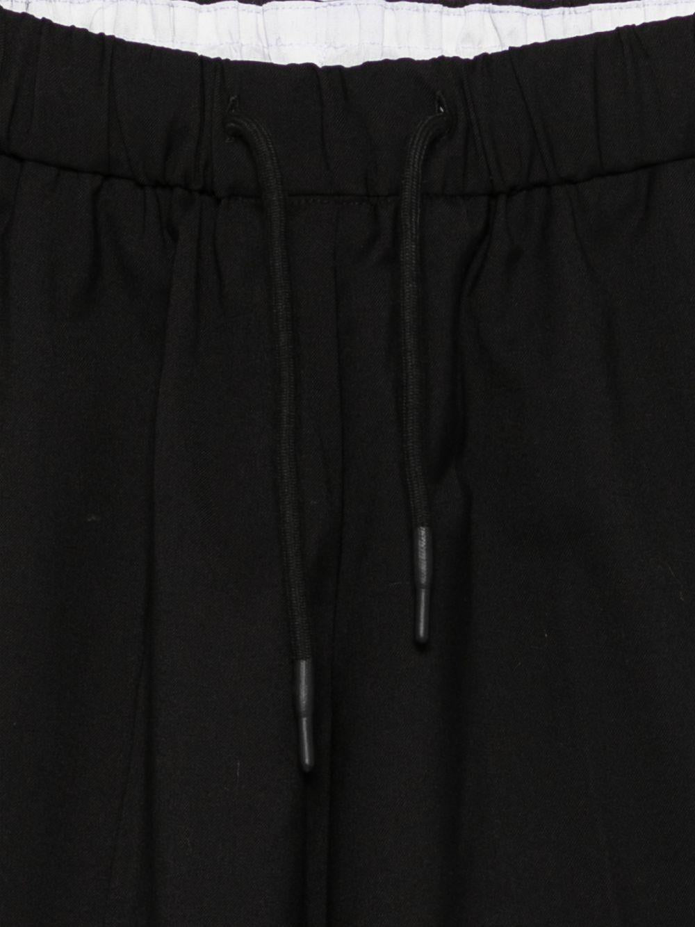 Shorts per bambino John Richmond Junior neri con tappa con logo sul retro RBP26242BE BLACK JOHN RICHMOND KIDS