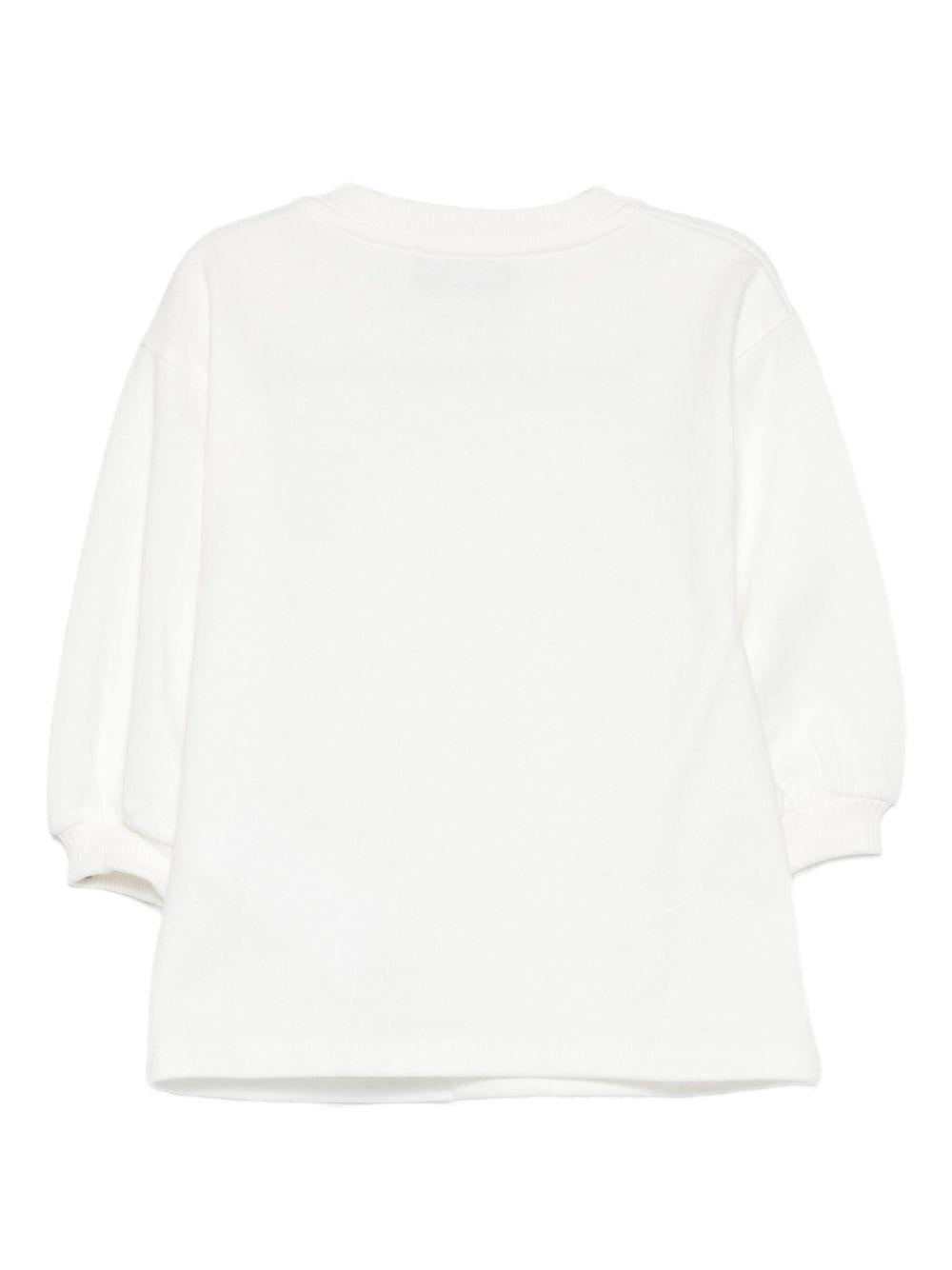 Abito per neonata Moschino Kids bianco con maniche a sbuffo MAV0BNLCA40 10063 MOSCHINO KIDS