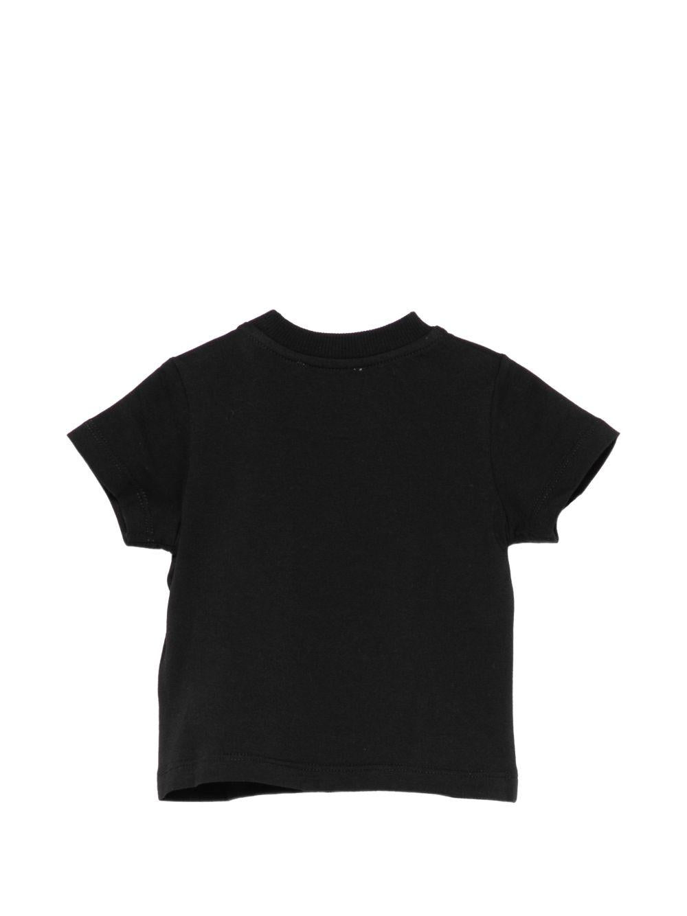 T-shirt per neonato Moschino Kids nera con stampa grafica MUM04LLAA24 60100 MOSCHINO KIDS