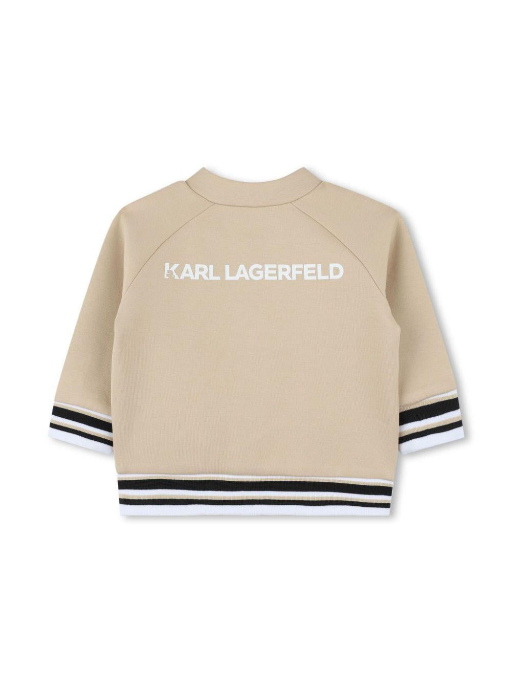 Tuta sportiva per neonato Karl Lagerfeld Kids beige con stampa Ikonik Karl (set di 3) Z30503 296 KARL LAGERFELD KIDS