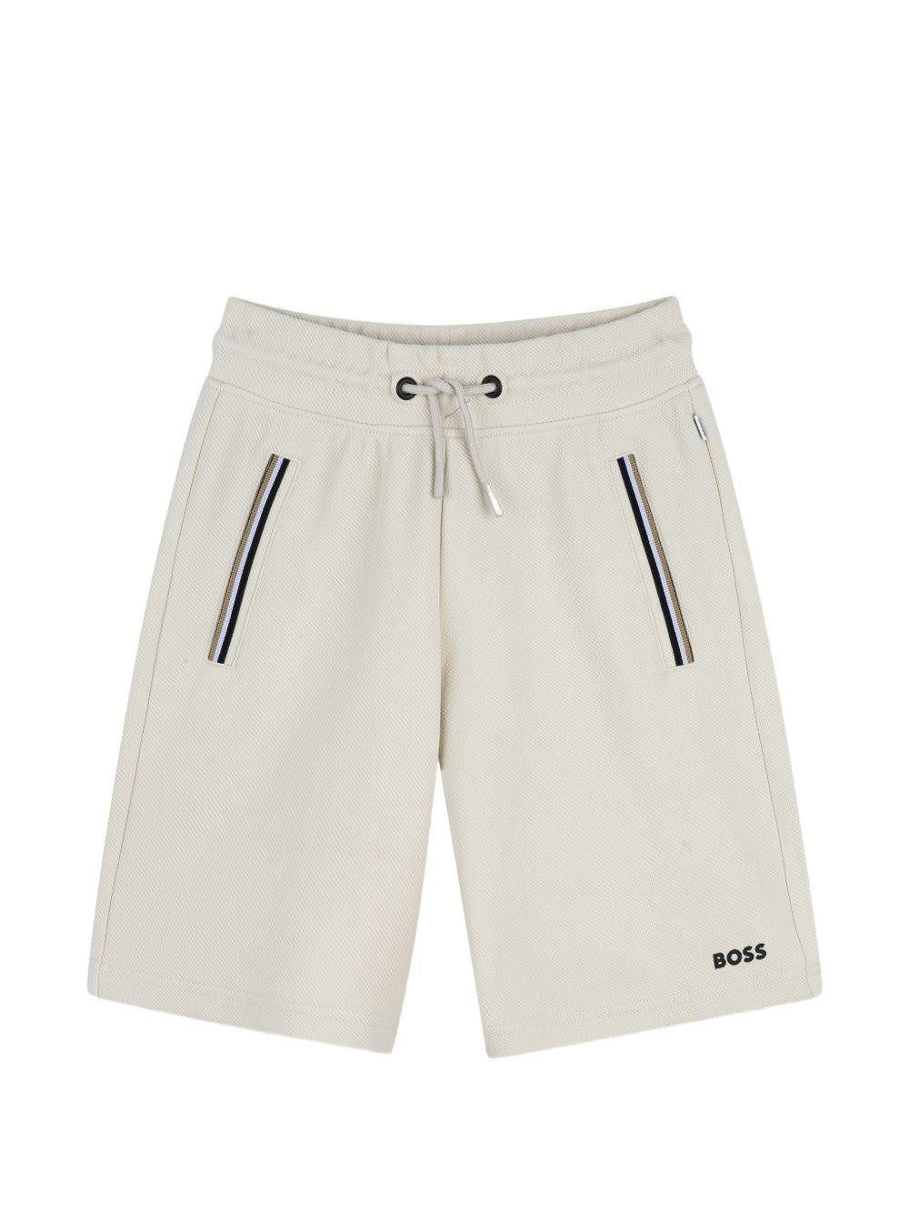Shorts per bambino Boss Kids beige con dettagli a righe J52932 21C BOSS KIDS
