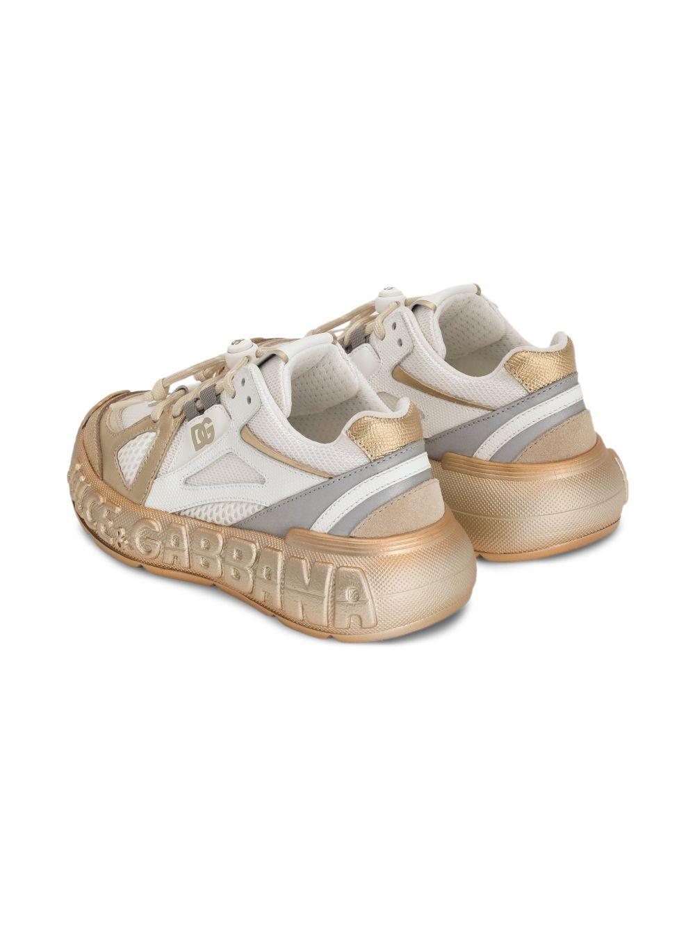 Sneakers per bambini Dolce & Gabbana Kids oro con dettaglio logo D11371 AX075 89662 DOLCE & GABBANA KIDS