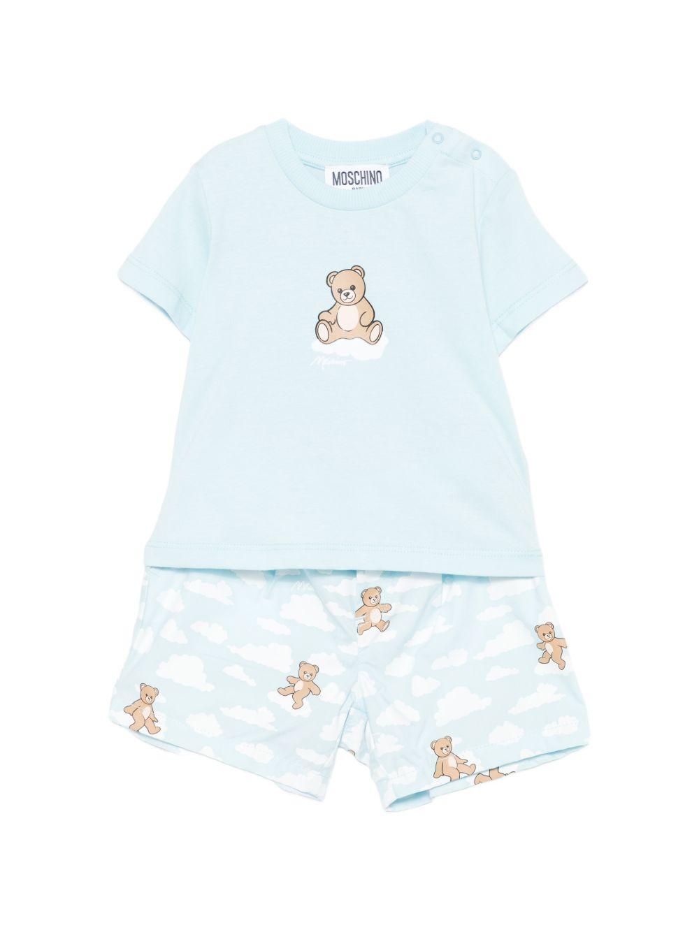 Set T-shirt e shorts per neonato Moschino Kids azzurro con stampa nuvole MUG01QLLB61 83679 MOSCHINO KIDS