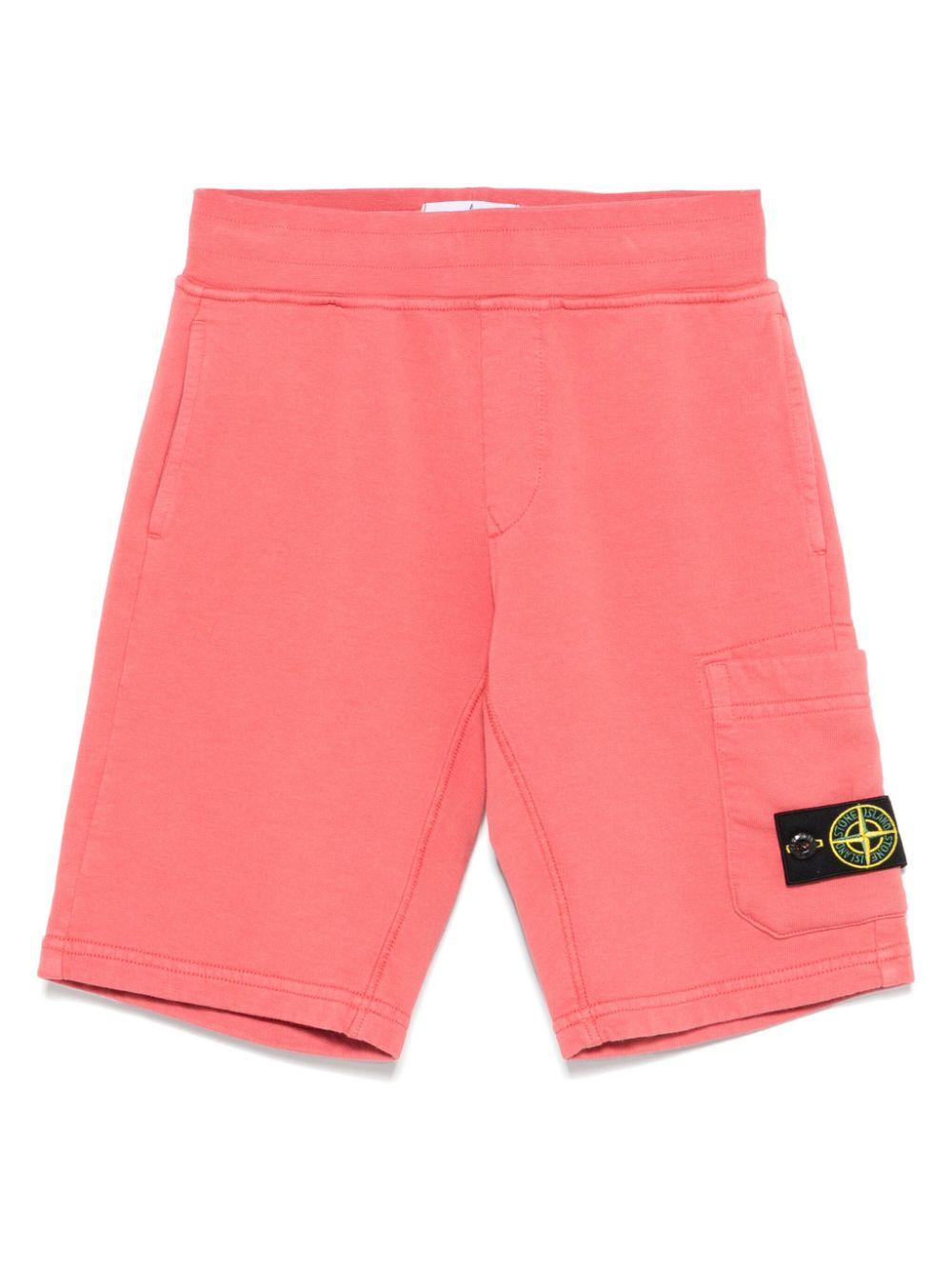 Shorts con applicazione Compass per bambino Stone Island Junior rosa con tasca laterale K1S166200006S0040 V0089 STONE ISLAND JUNIOR