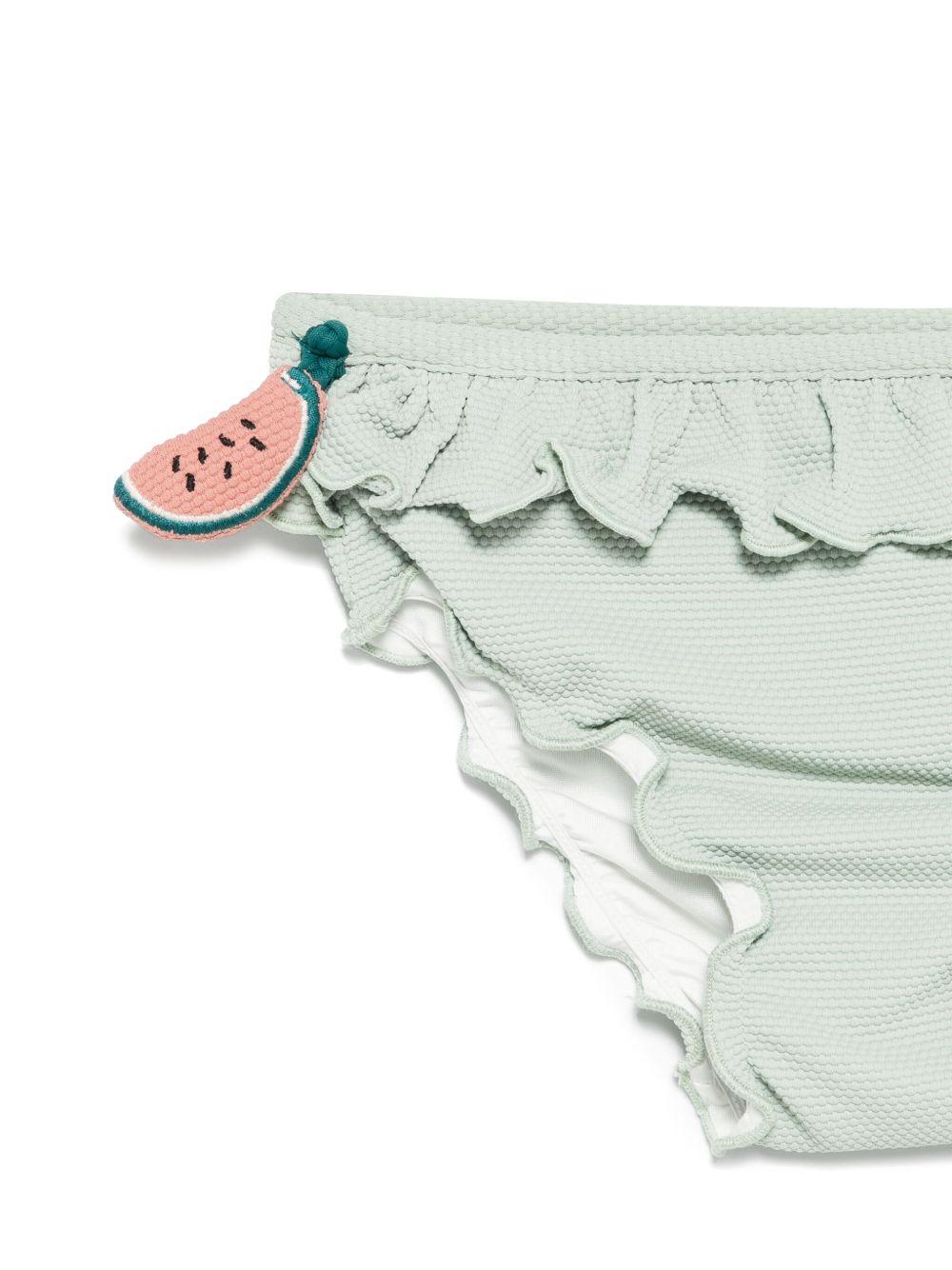Slip bikini per bambina Donsje Sisi verde con dettagli con ruches 4501302 110ZB DONSJE