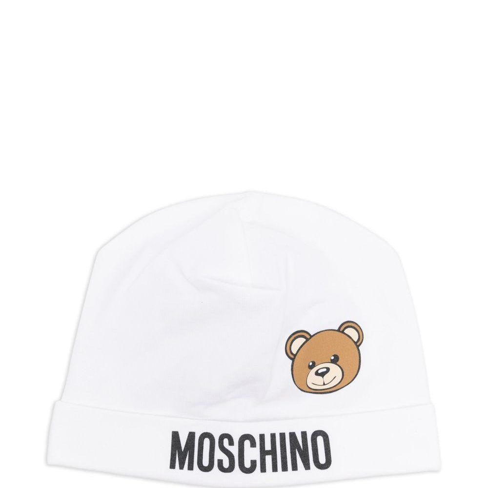 Cappello per neonato Moschino Kids bianco con stampa logo e Teddy Bear MUX05ALBA00 10101 MOSCHINO KIDS