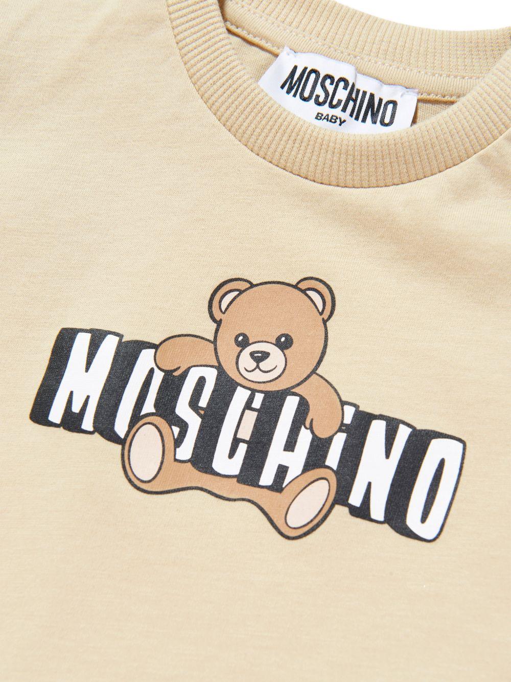 T-shirt per neonati Moschino Kids beige con logo sul davanti MUM04PLAA03 20829 MOSCHINO KIDS