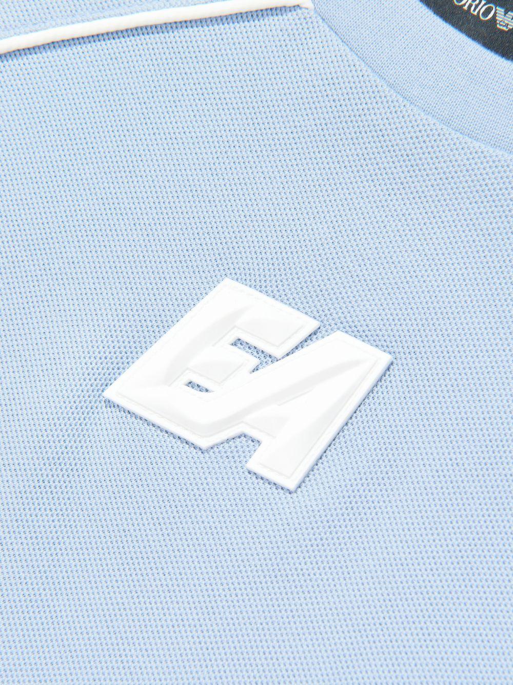 T-shirt per bambino Emporio Armani Kids azzurra con toppa con logo sul davanti EB001345 AF10497 U9360 EMPORIO ARMANI KIDS