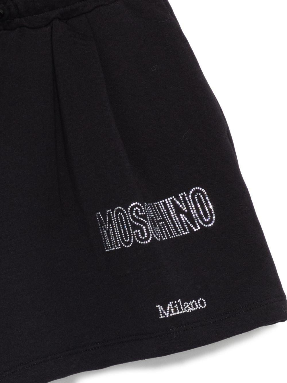 Shorts per bambina Moschino Kids neri con dettagli in strass HDQ020LDA25 60100 MOSCHINO KIDS