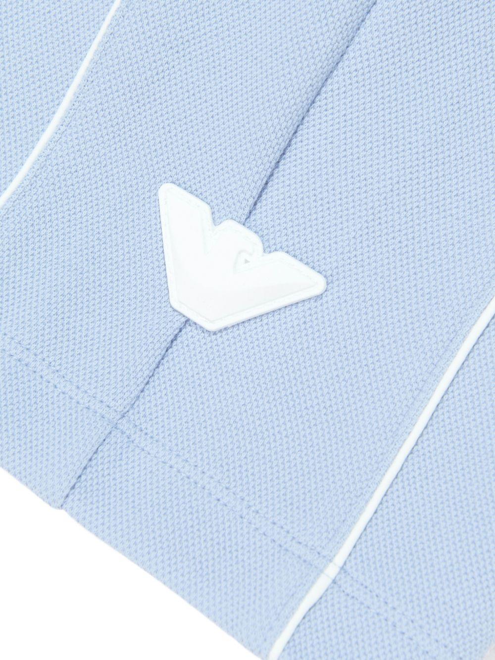Shorts per bambino Emporio Armani Kids azzurri con logo aquila sul davanti EB001340 AF20638 U9360 EMPORIO ARMANI KIDS