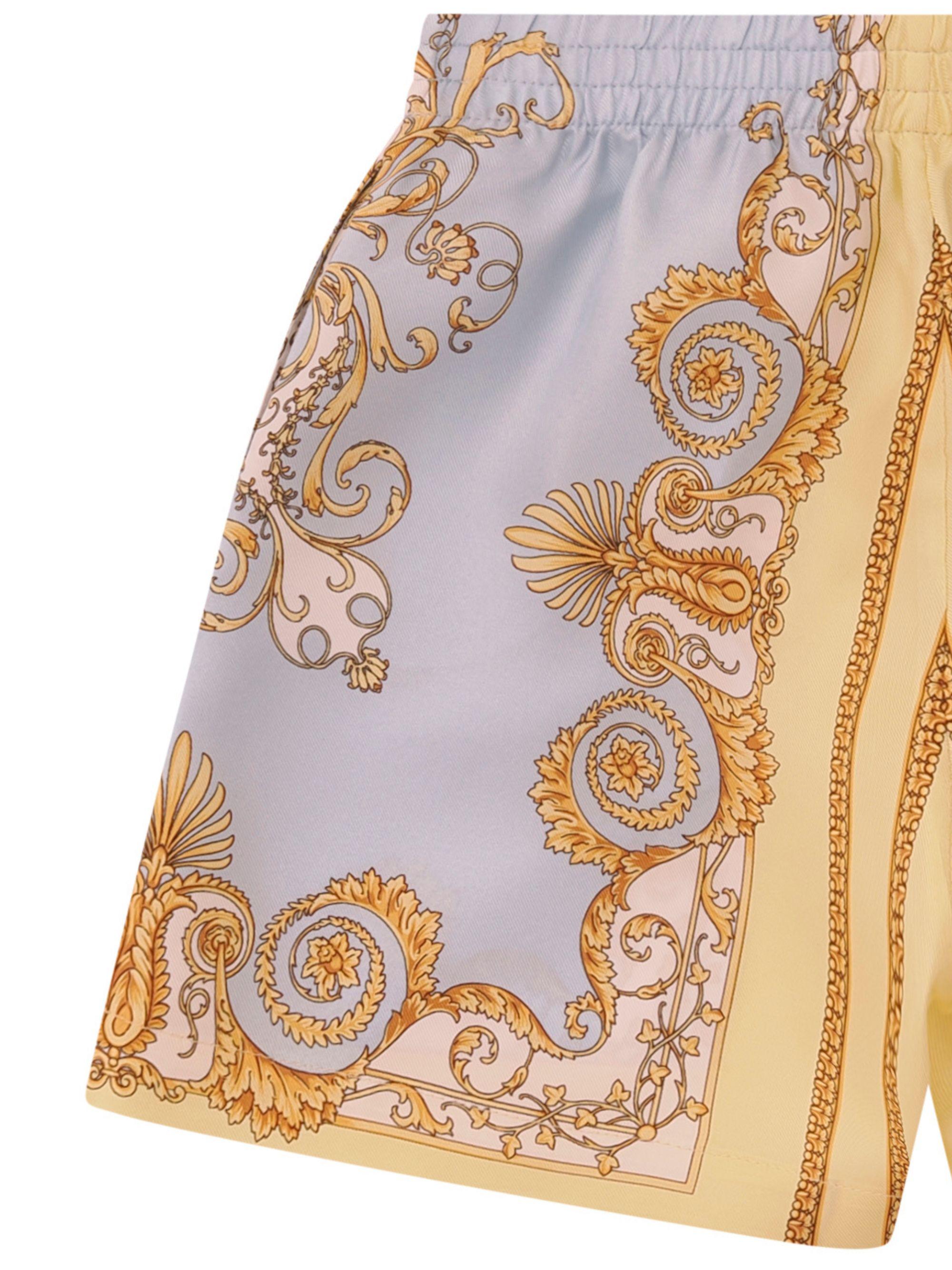 Shorts per neonato Versace Kids bianco con decorazioni oro 10195321A17228 5Y580 VERSACE KIDS