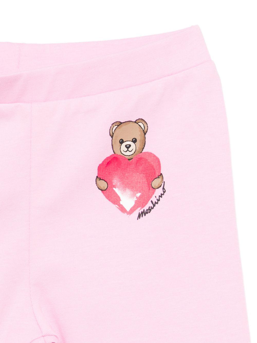 Leggins per neonata Moschino Kids rosa con dettaglio Teddy Bear con cuore MIP032LBA00 51473 MOSCHINO KIDS