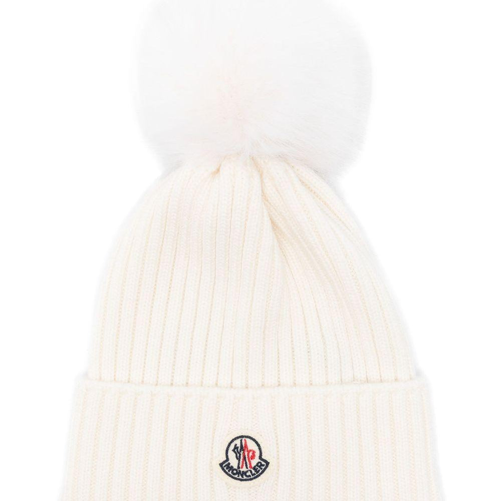 Berretto per bambina Moncler Enfant bianco con pompon L29543B00007M1131 030 MONCLER KIDS