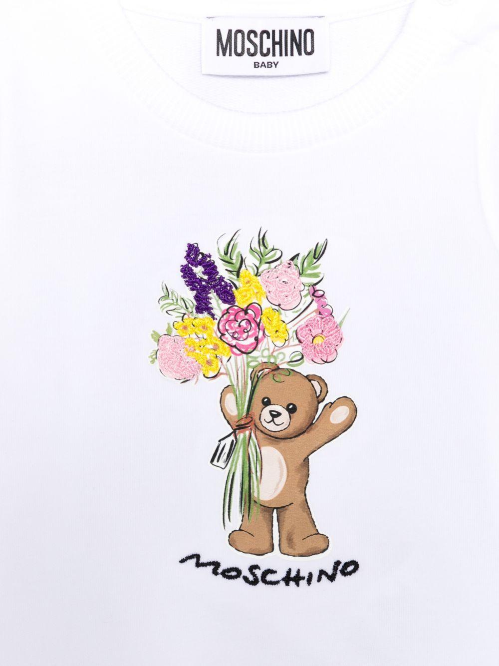 Felpa per neonata Moschino Kids bianca con dettaglio floreale MDF035LDA00 10101 MOSCHINO KIDS