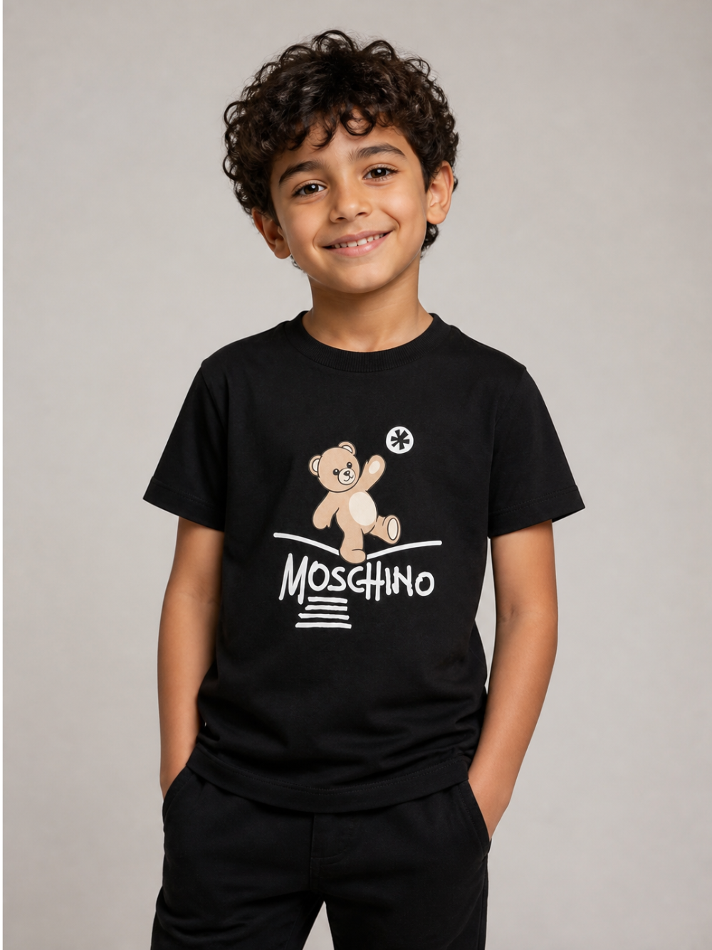 T-shirt per bambini Moschino Kids nera con motivo Teddy Bear HUM05XLAA20 60100 MOSCHINO KIDS