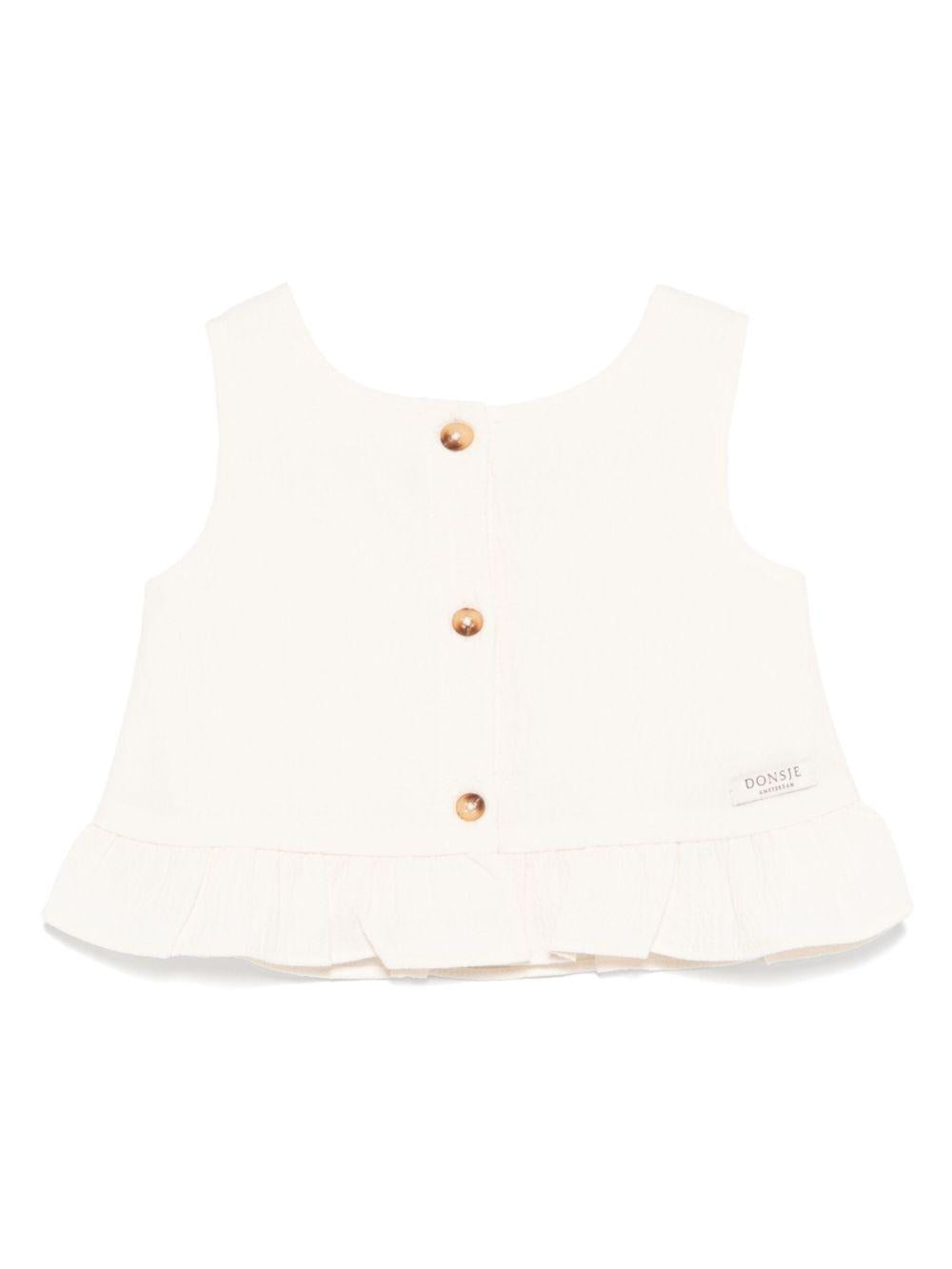 Top per neonata Donsje Francise bianco con orlo increspato 3036300 00003 DONSJE