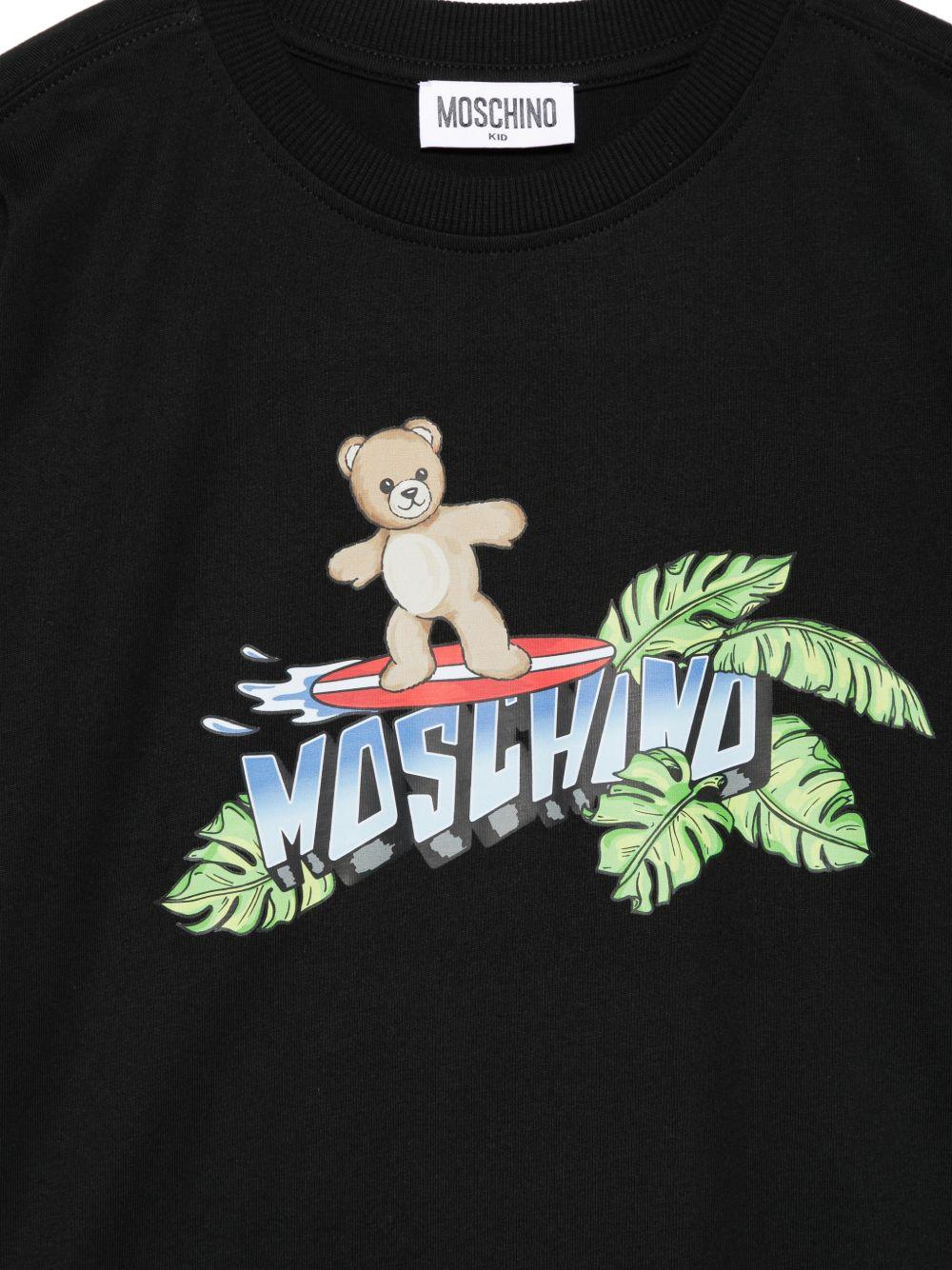 T-shirt per bambino Moschino Kids nera con stampa grafica sul davanti HUM05KLAA23 60100 MOSCHINO KIDS