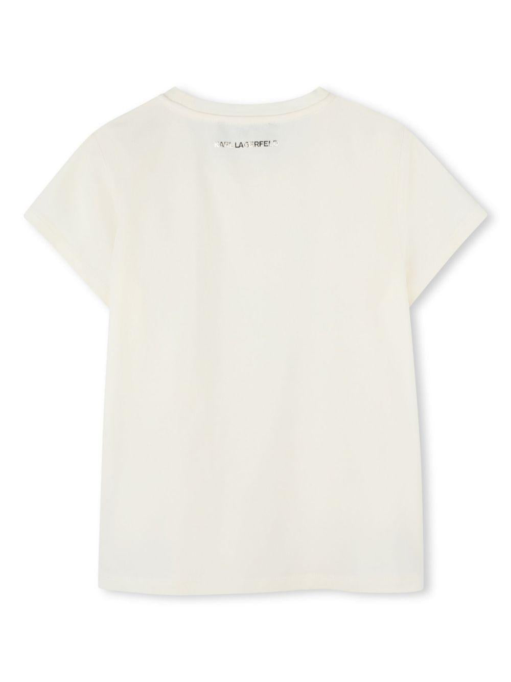 T-shirt con stampa grafica per bambina Karl Lagerfeld Kids bianco con scollo rotondo Z30447 122 KARL LAGERFELD KIDS