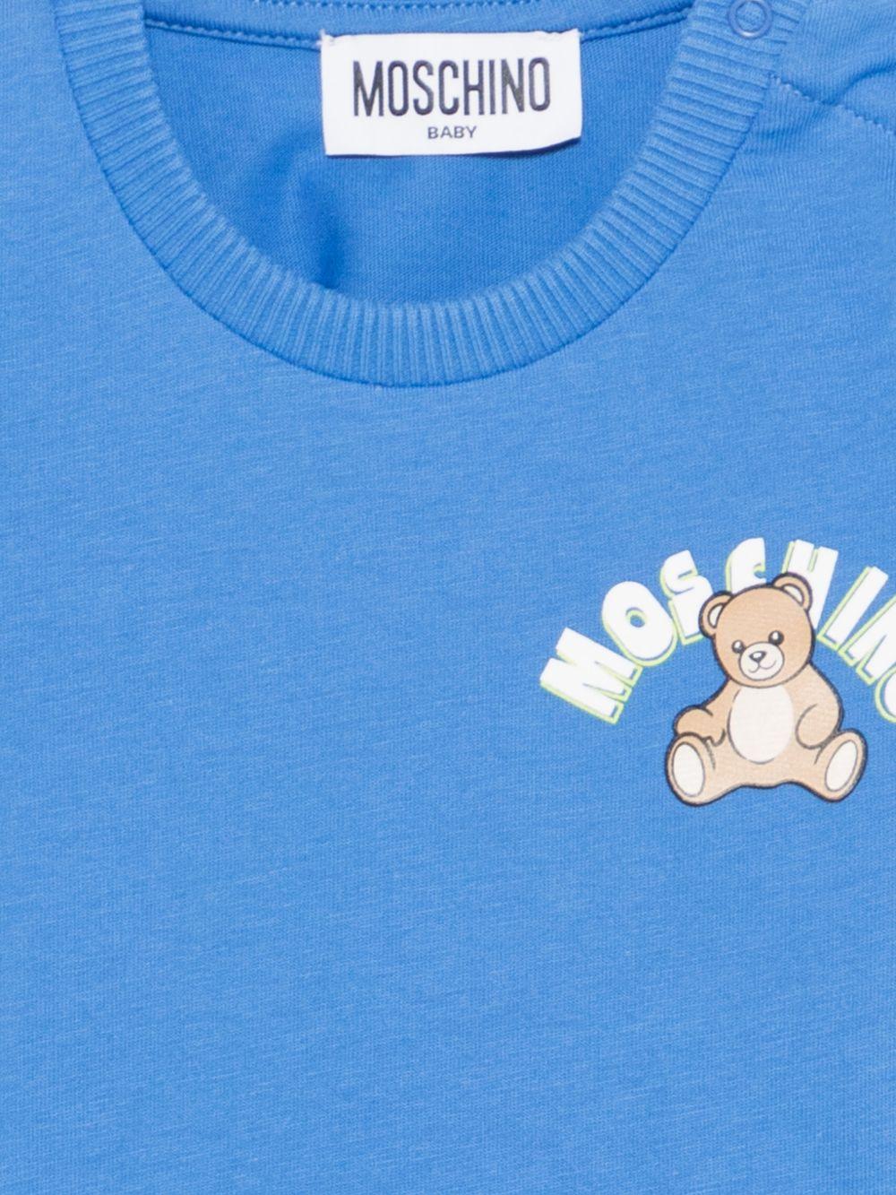 T-shirt per neonati Moschino Kids azzura con stampa Teddy Bear sul davanti MZM047LAA01 40630 MOSCHINO KIDS