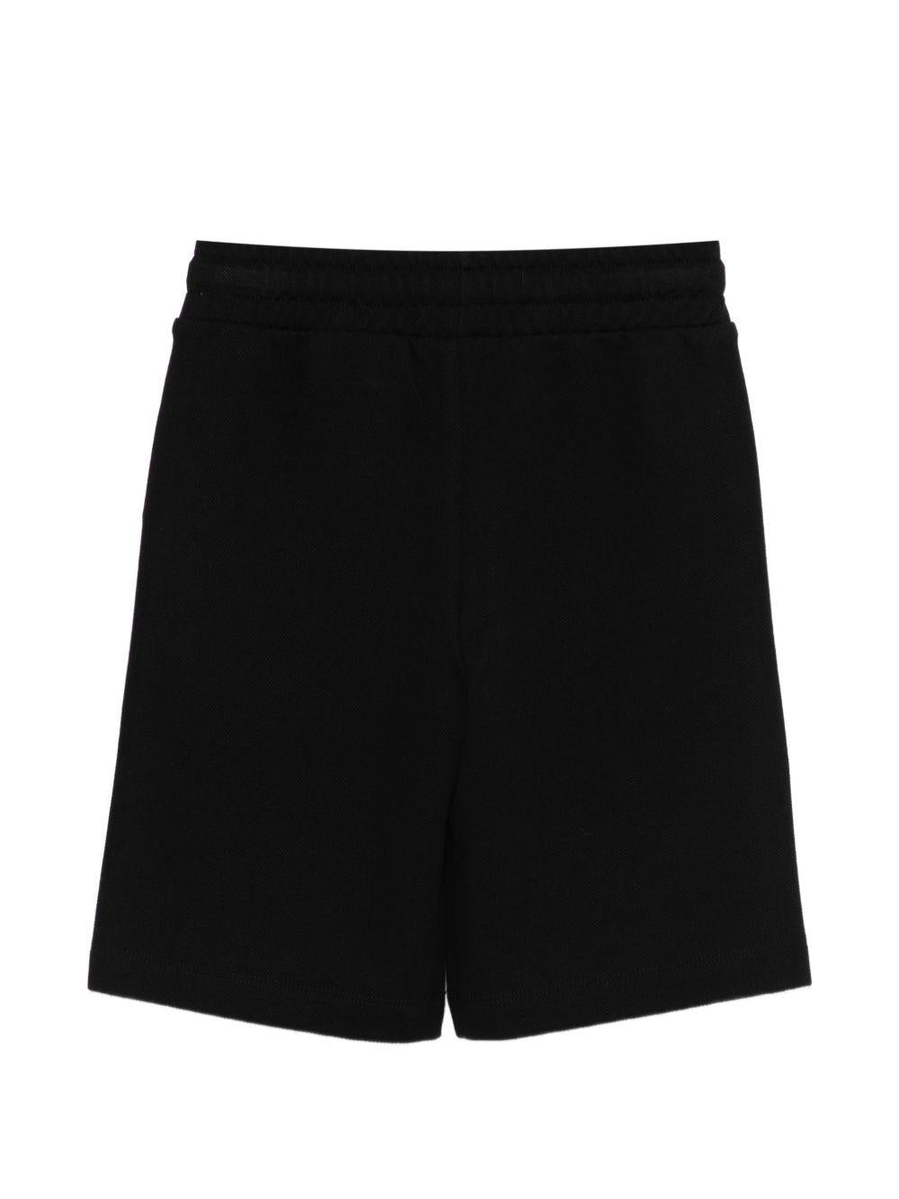 Shorts per bambino Moschino Kids neri con logo sul davanti HUQ02LLCA90 60100 MOSCHINO KIDS