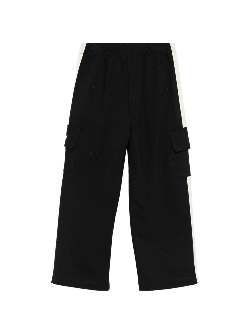 Pantaloni sportivi per bambina Palm Angels Kids neri con decorazioni sui lati PGCJ011S26FLE001 110 PALM ANGELS KIDS