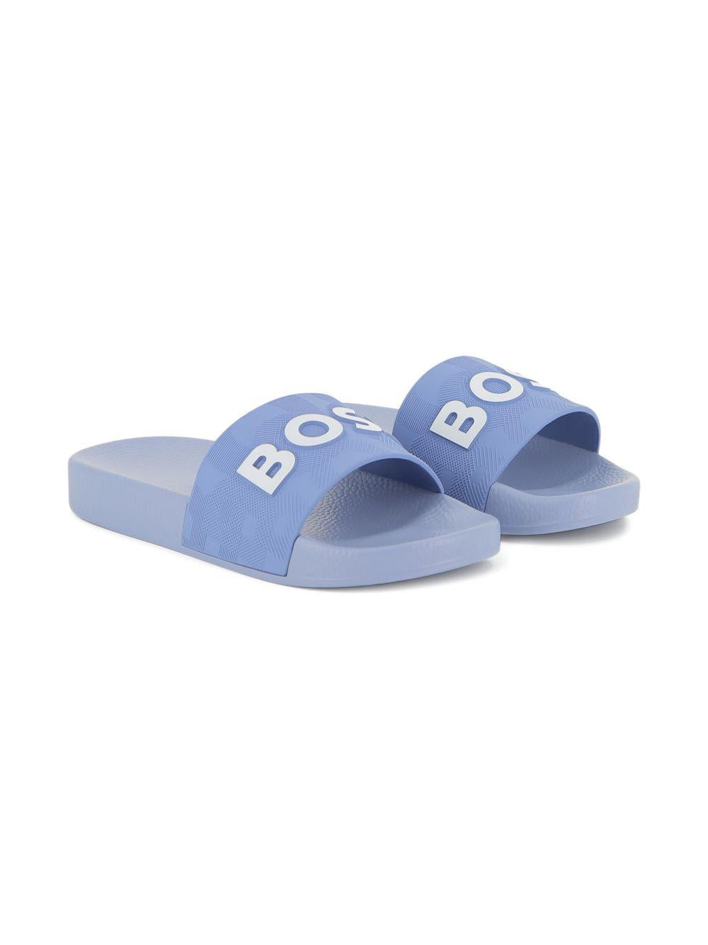 Ciabatte da bambino Boss Kids azzurre con logo J52799 881 BOSS KIDS