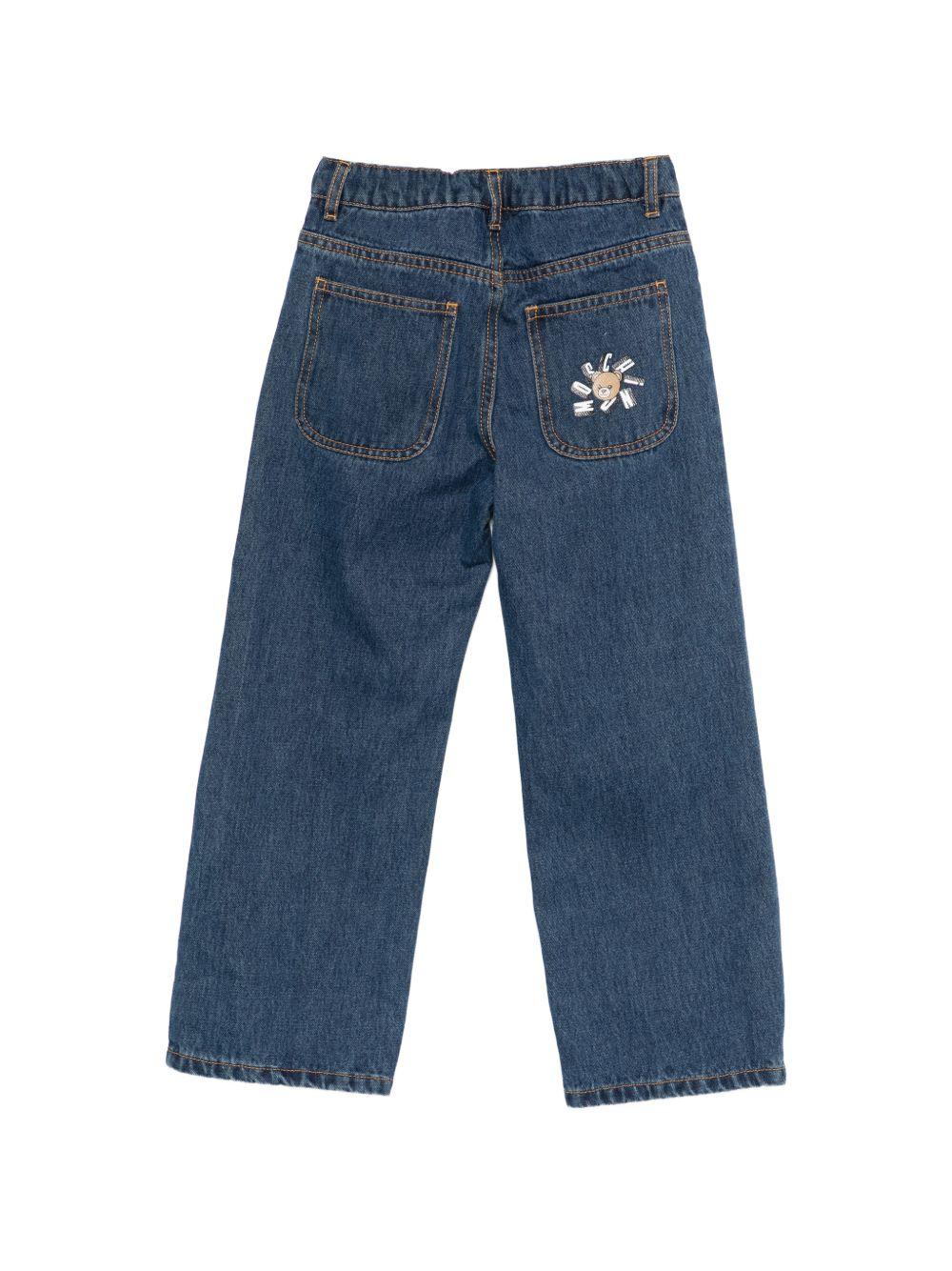 Jeans per bambino Moschino Kids denim con design gamba dritta HUP08VL0E35 41104 MOSCHINO KIDS