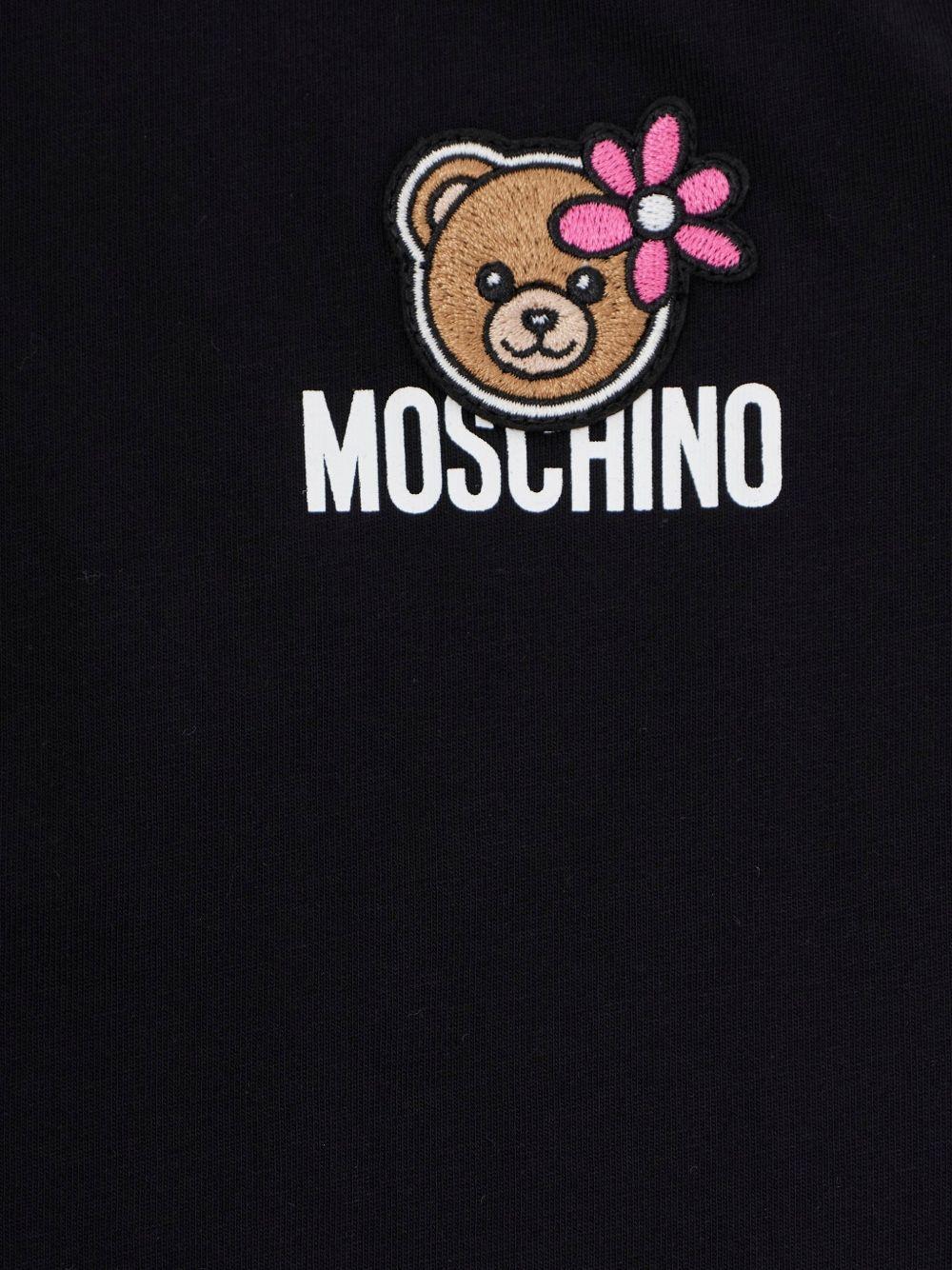 T-shirt per bambina Moschino Kids nera con stampa orsetto HAM03PLAA02 60100 MOSCHINO KIDS