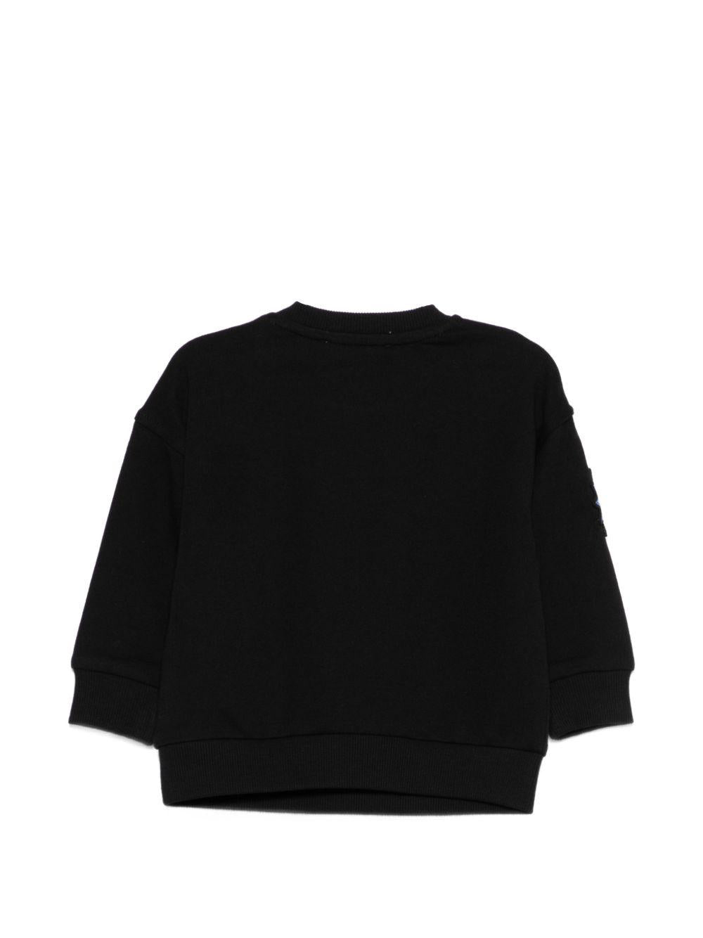 Felpa per neonati Moschino Kids nera con dettagli in rilievo M9F03QLCA19 60100 MOSCHINO KIDS