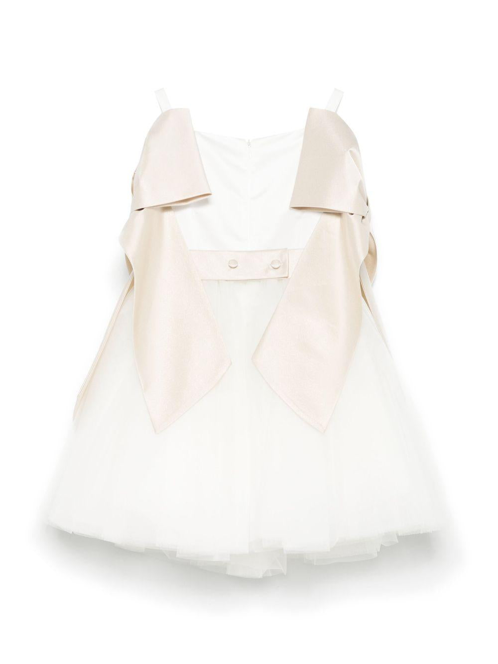 Abito per bambina Colorichiari bianco con fiocco e applicazione a fiori FB108018 3232 2042 COLORICHIARI