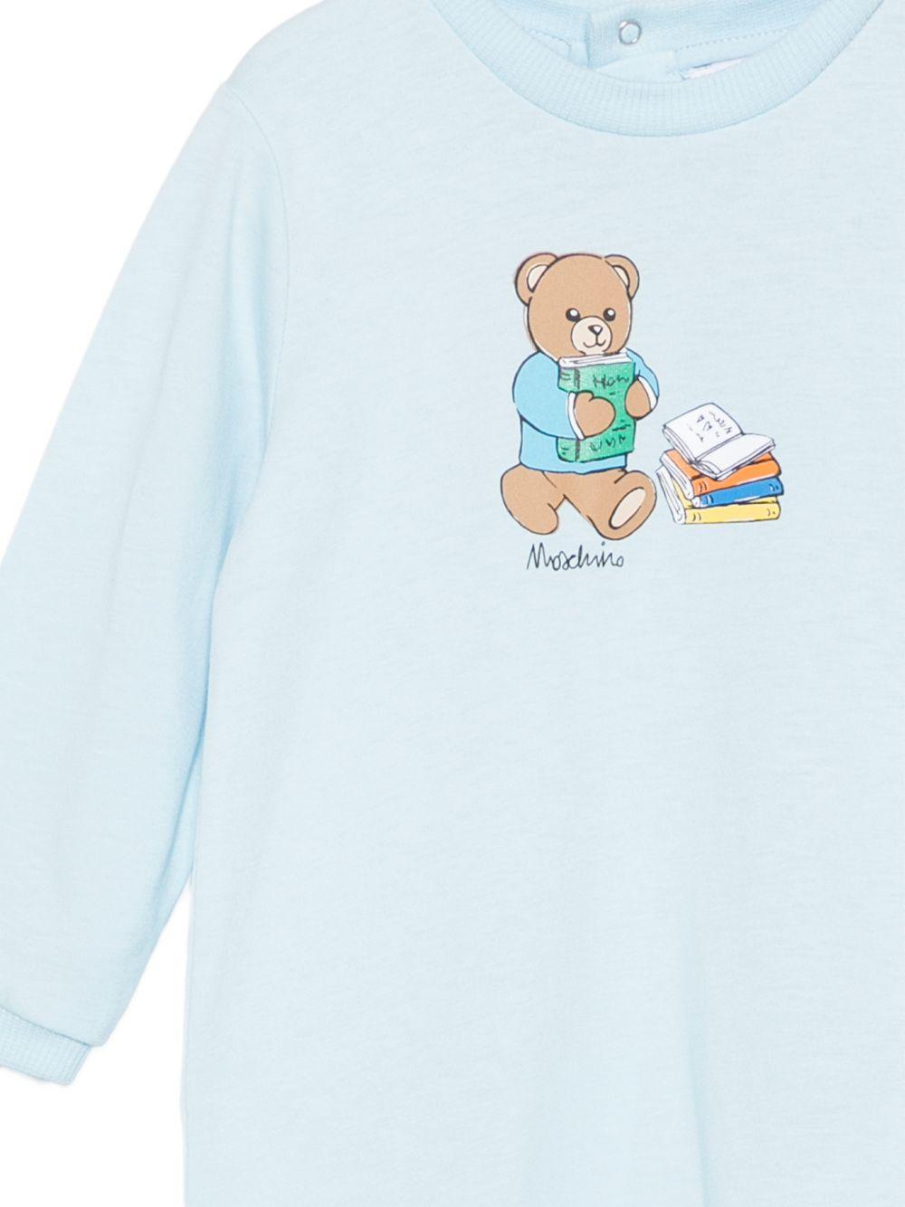 Tutina per neonato Moschino Kids azzurra con motivo Teddy Bear MUT04XLAA10 40304 MOSCHINO KIDS