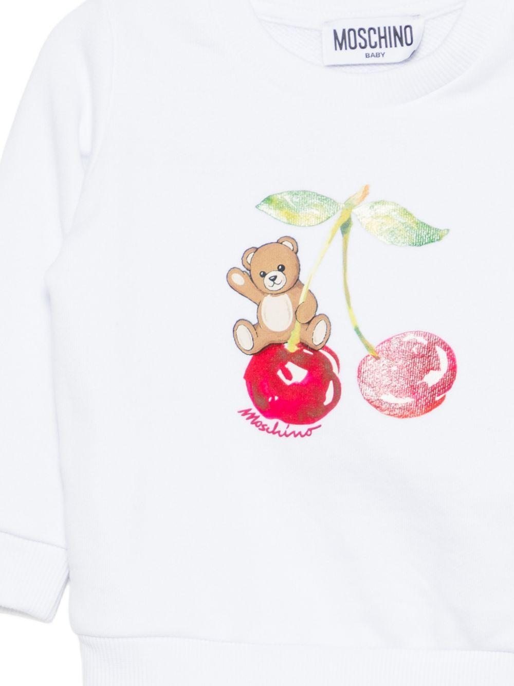 Felpa per neonata Moschino Kids bianca con stampa ciliegie MGF02KLCA52 10101 MOSCHINO KIDS